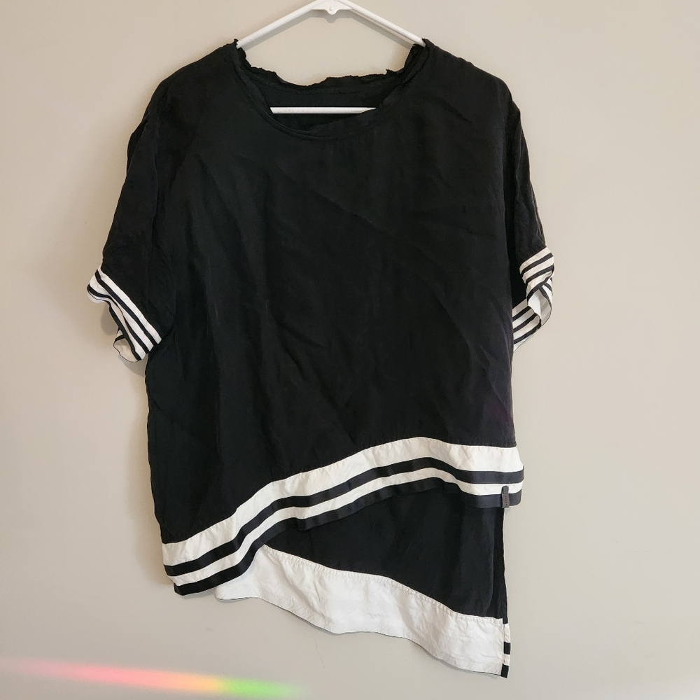 Asymmetrical Top by RUDSAK